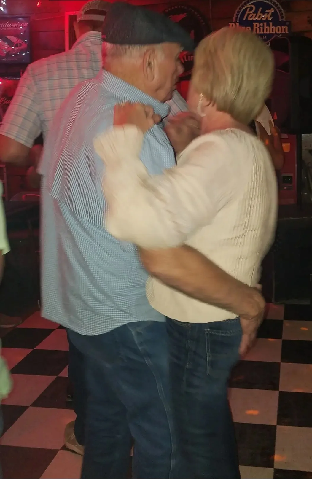 Homer and Janice Starling dancing on the checkerboard floor at J's Landing